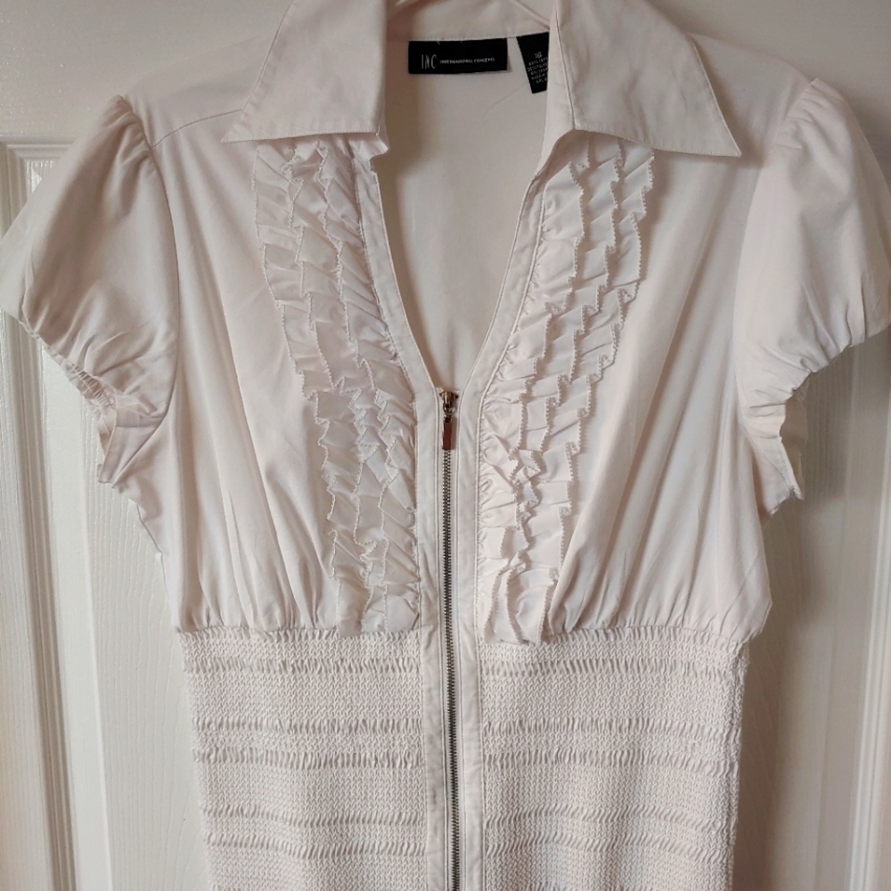 Women's casual shirt, with zipper. Cotton polyester & 5% spandex. Lightly used.